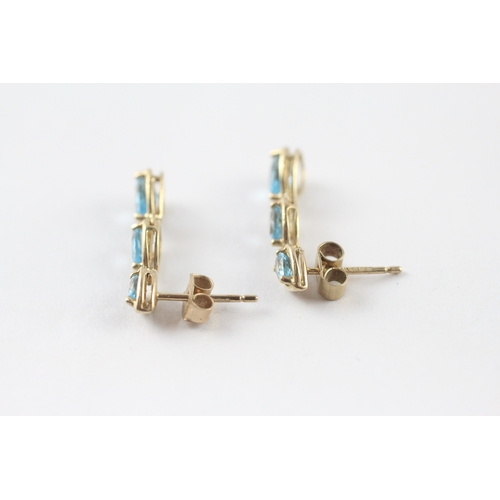 55 - 9ct gold blue topaz drop earrings (1.8g)