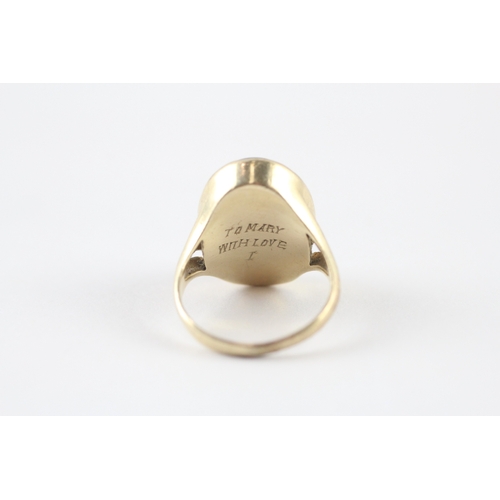 69 - 9ct gold garnet cabochon signet ring (5.4g) Size M