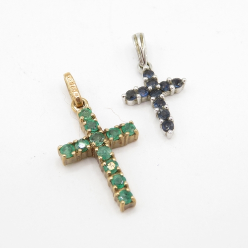 127 - 2x 9ct gold emerald sapphire cross pendant (1.6g)