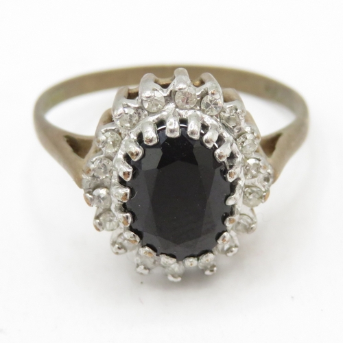 158 - 9ct gold diamond and sapphire cluster ring (2.2g) Size K 1/2