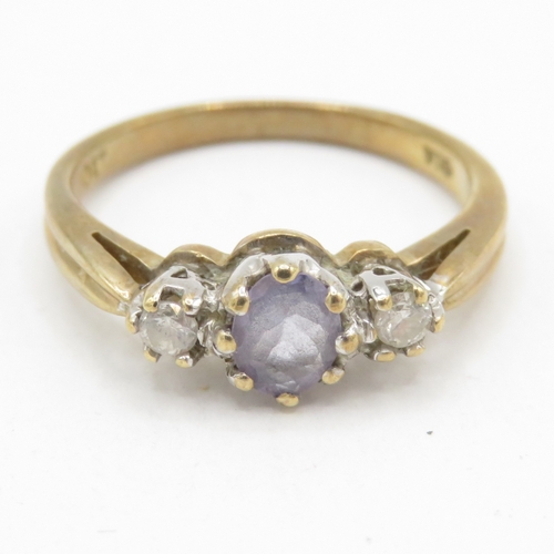 163 - 9ct gold tanzanite diamond trilogy ring (2.3g) Size L