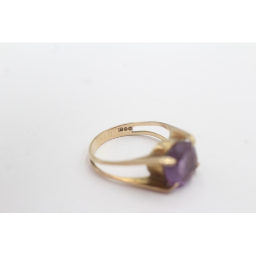123 - 9ct gold amethyst solitaire ring (2.8g) Size M