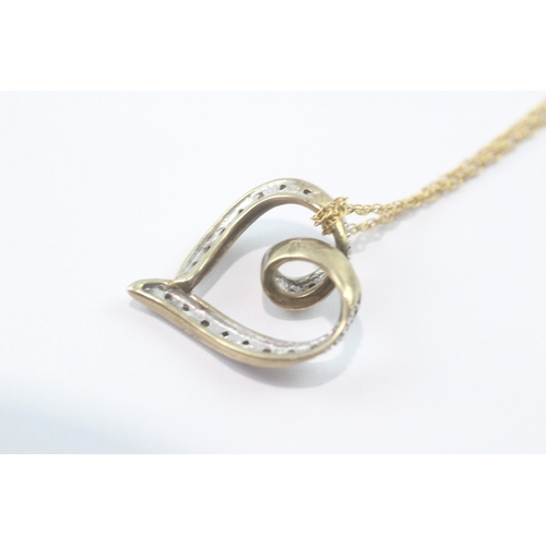 124 - 9ct gold diamond heart pendant necklace (3.2g)