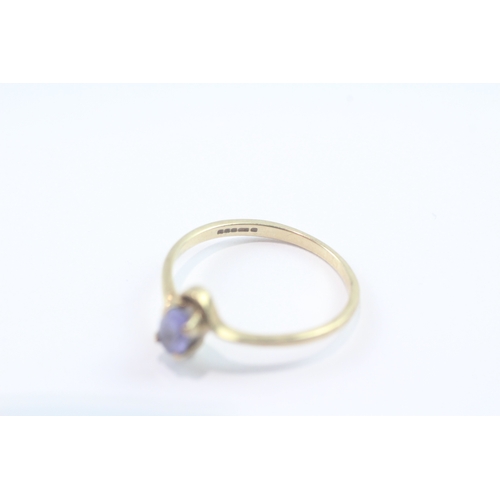 152 - 9ct gold tanzanite crossover ring (1.7g) Size P