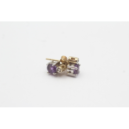 157 - 9ct gold amethyst diamond stud earrings (1.3g)