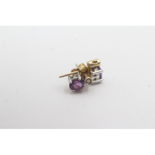 157 - 9ct gold amethyst diamond stud earrings (1.3g)