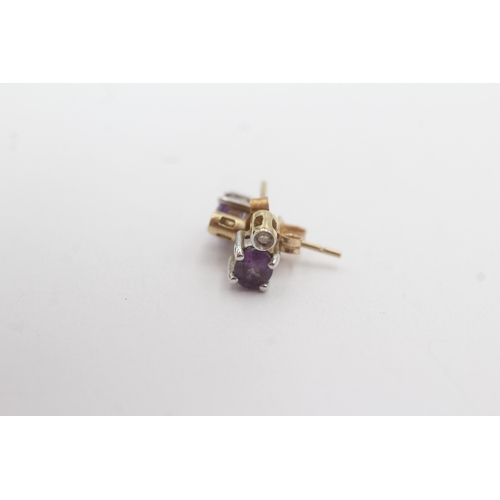 157 - 9ct gold amethyst diamond stud earrings (1.3g)