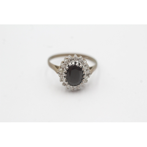 158 - 9ct gold diamond and sapphire cluster ring (2.2g) Size K 1/2