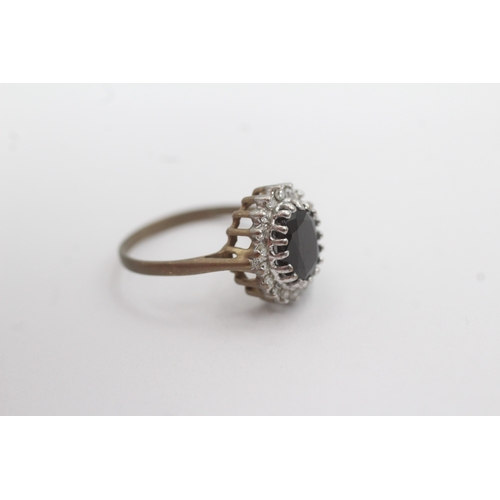 158 - 9ct gold diamond and sapphire cluster ring (2.2g) Size K 1/2