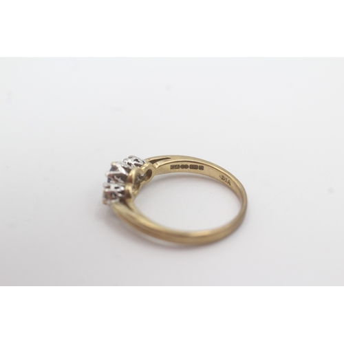 163 - 9ct gold tanzanite diamond trilogy ring (2.3g) Size L