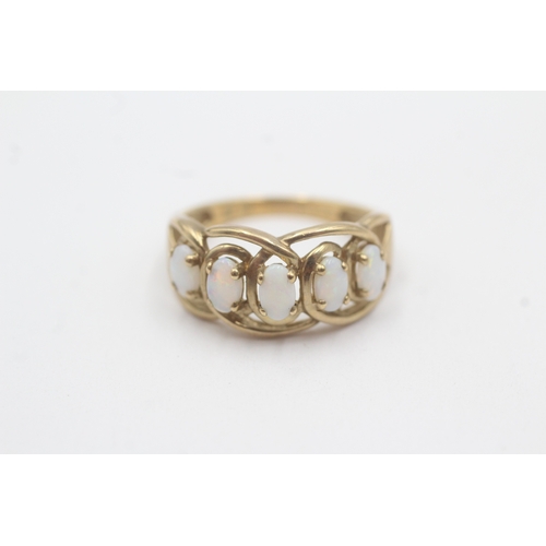 164 - 9ct gold opal five-stone ring (2.6g) Size N