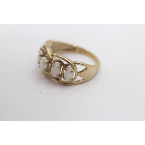 164 - 9ct gold opal five-stone ring (2.6g) Size N