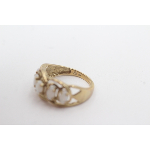 164 - 9ct gold opal five-stone ring (2.6g) Size N