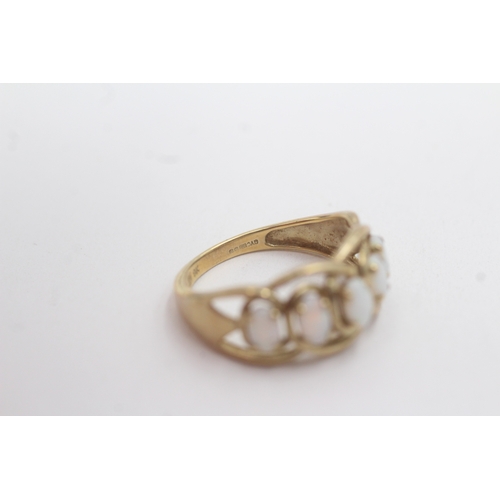 164 - 9ct gold opal five-stone ring (2.6g) Size N