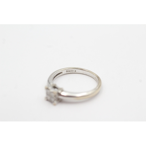 166 - 18ct white gold diamond princess cut invisible set ring (3.2g) Size K