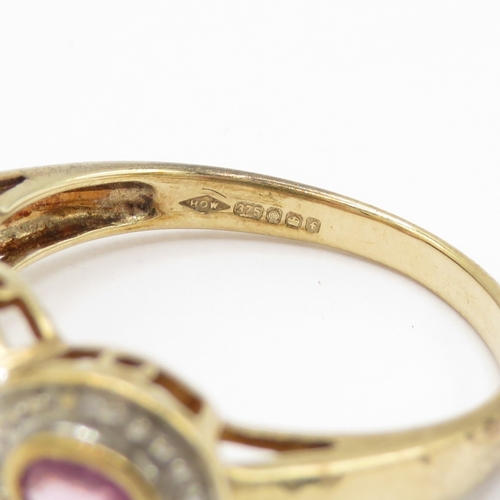 10 - 9ct gold pink sapphire and diamond dress ring  (2.64g) Size O