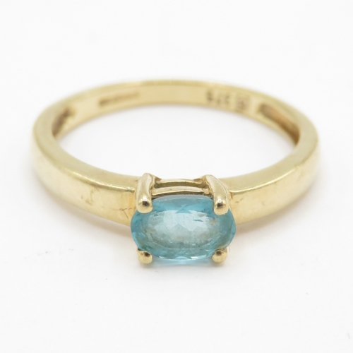49 - 9ct gold blue gemstone solitaire ring (1.5g) Size L