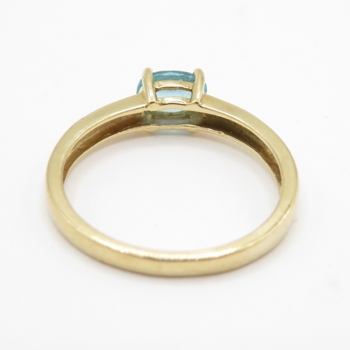 49 - 9ct gold blue gemstone solitaire ring (1.5g) Size L