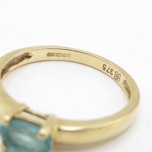 49 - 9ct gold blue gemstone solitaire ring (1.5g) Size L