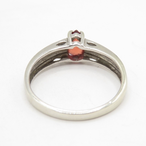 103 - 9ct white gold ruby solitaire ring  (2.5g) Size O