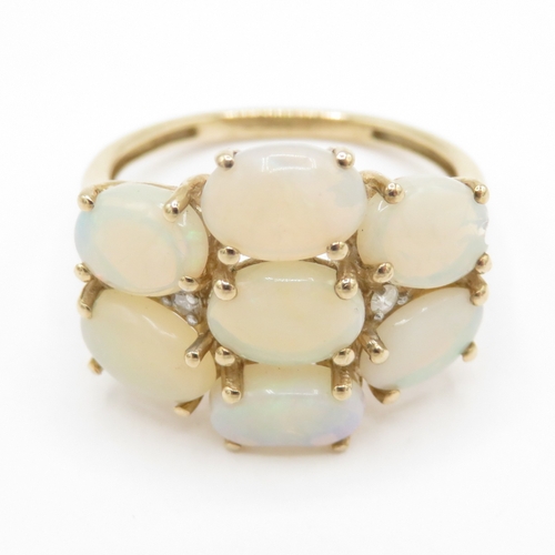 121 - 9ct gold opal diamond dress ring  (2.8g) Size N