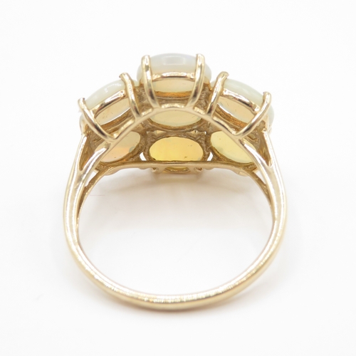 121 - 9ct gold opal diamond dress ring  (2.8g) Size N