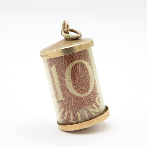 126 - 9ct gold emergency money charm (2.5g)