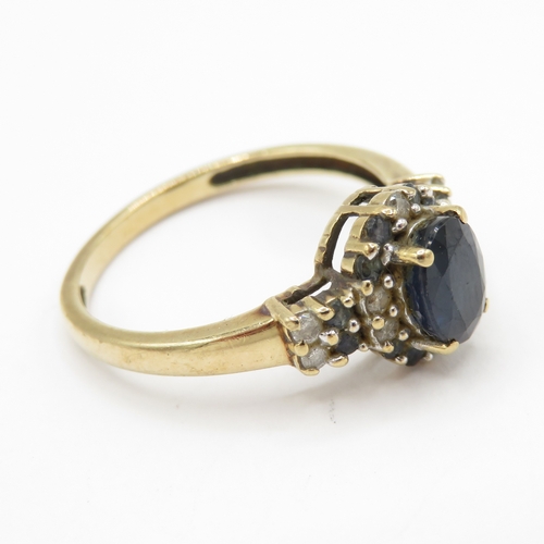 127 - 9ct gold sapphire and diamond halo ring  (2.4g) Size O