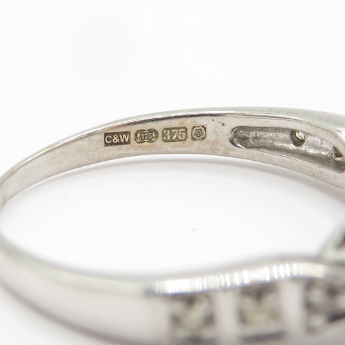 129 - 9ct gold sapphire and diamond ring (2.9g) Size O