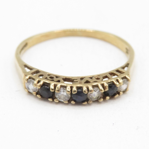 13 - 9ct gold sapphire and white gemstone channel set ring  (1.6g) Size N