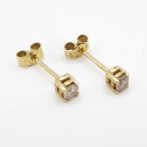 133 - 9ct gold diamond stud earrings (0.5g)