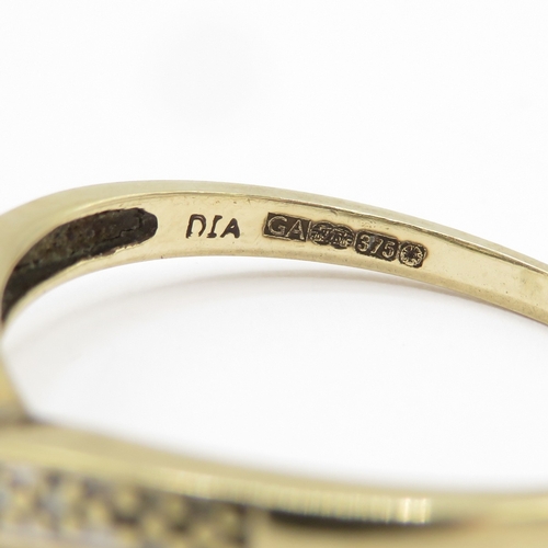142 - 9ct gold diamond wishbone ring  (1.8g) Size R 1/2