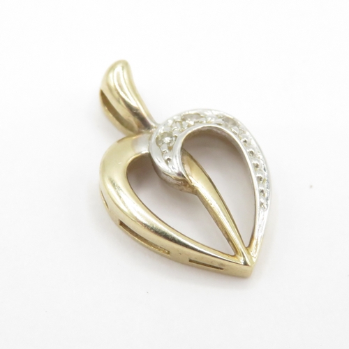 144 - 9ct gold diamond heart pendant (0.9g)