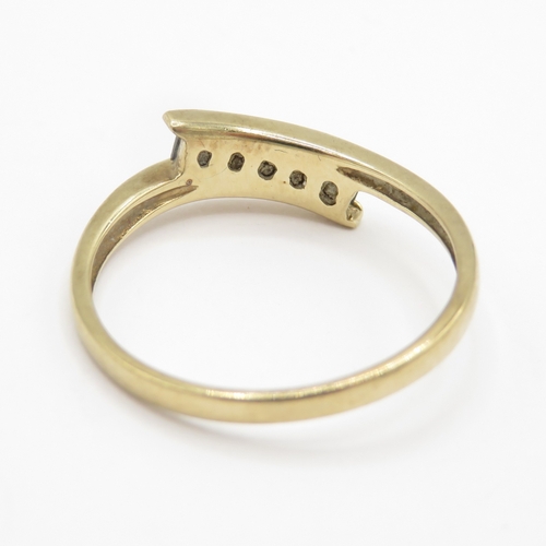 154 - 9ct gold topaz and white gemstone bypass ring (1.6g) Size N