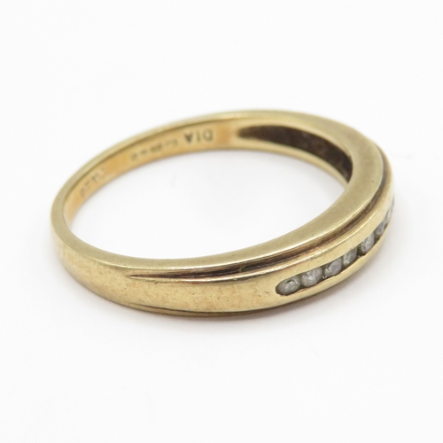 157 - 9ct gold diamond channel set ring (2.4g) Size M 1/2
