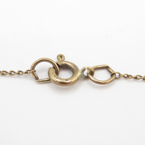 169 - 9ct gold necklace with red gemstone (2.3g)