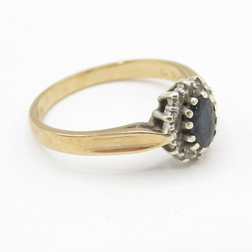 57 - 9ct gold diamond and sapphire halo ring (2.8g) Size P 1/2