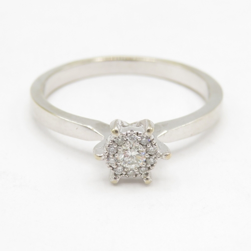 93 - 9ct gold diamond cluster ring  (2.5g) Size Q 1/2