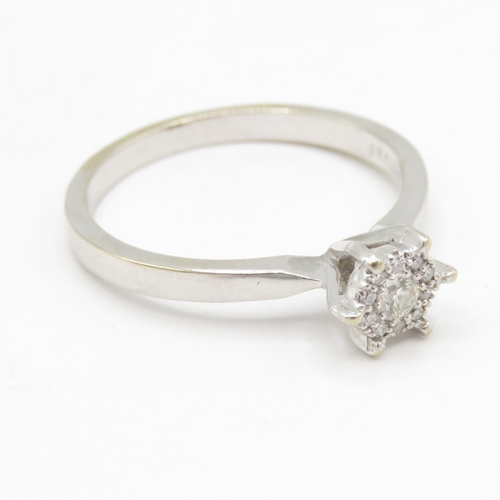 93 - 9ct gold diamond cluster ring  (2.5g) Size Q 1/2