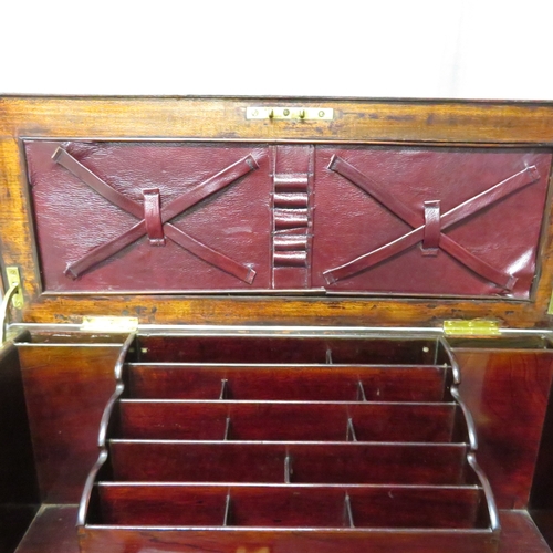 280 - A gentleman's compendium with lock stand and has front opening with campaign handles.  In good condi... 