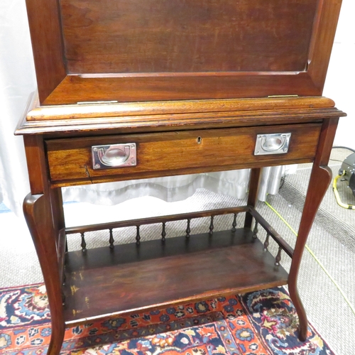 280 - A gentleman's compendium with lock stand and has front opening with campaign handles.  In good condi... 