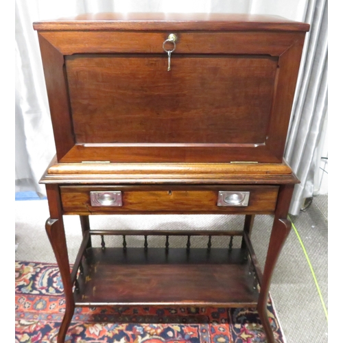 280 - A gentleman's compendium with lock stand and has front opening with campaign handles.  In good condi... 