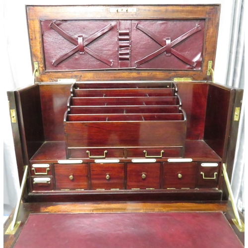 280 - A gentleman's compendium with lock stand and has front opening with campaign handles.  In good condi... 