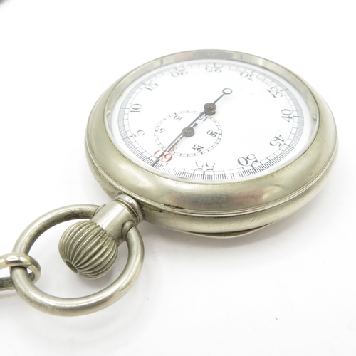 287 - Non silver pocket watch and chain with stand. Watch runs