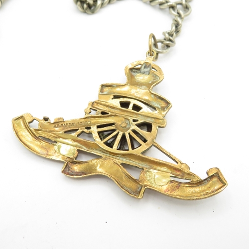 287 - Non silver pocket watch and chain with stand. Watch runs