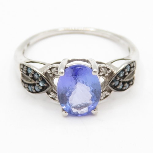 132 - 9ct gold tanzanite & diamond dress ring (2.5g) Size R 1/2