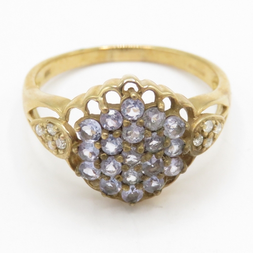 134 - 9ct gold tanzanite diamond cluster ring (2.9g) Size Q