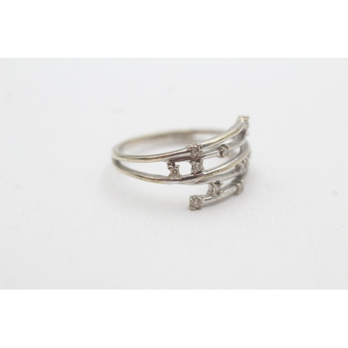 114 - 9ct white gold diamond dress ring (2.5g) Size O