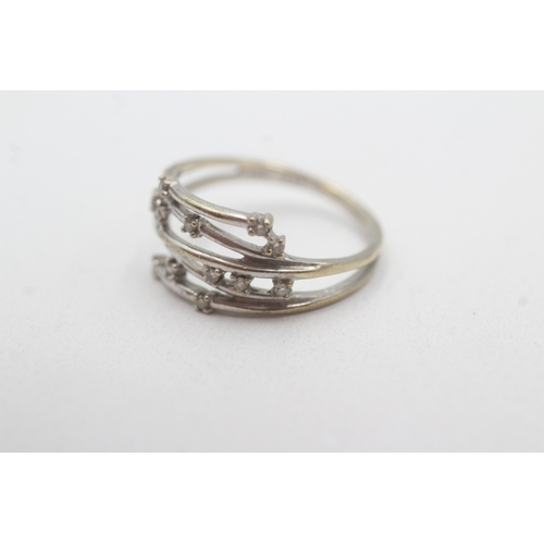 114 - 9ct white gold diamond dress ring (2.5g) Size O