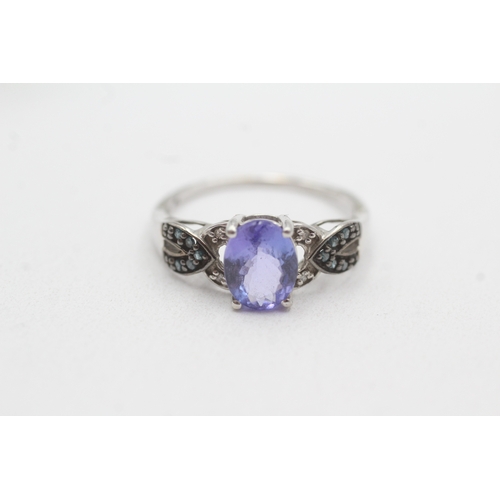 132 - 9ct gold tanzanite & diamond dress ring (2.5g) Size R 1/2